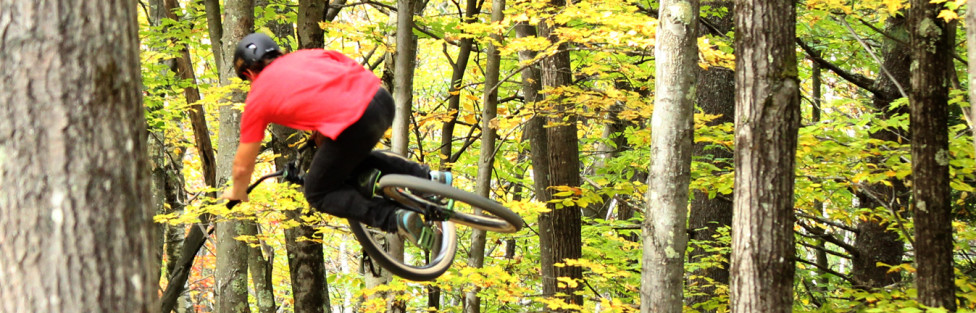 Adam Hauck shredding dirt jumps at Highland Mountain 2013